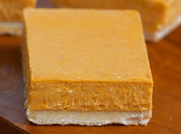 Easy-to-make pumpkin cheesecake bars from @choccoveredkt... like the lovechild of cheesecake and pumpkin pie! What's not to LOVE?! Full recipe: http://chocolatecoveredkatie.com/2015/09/14/pumpkin-cheesecake-bars/