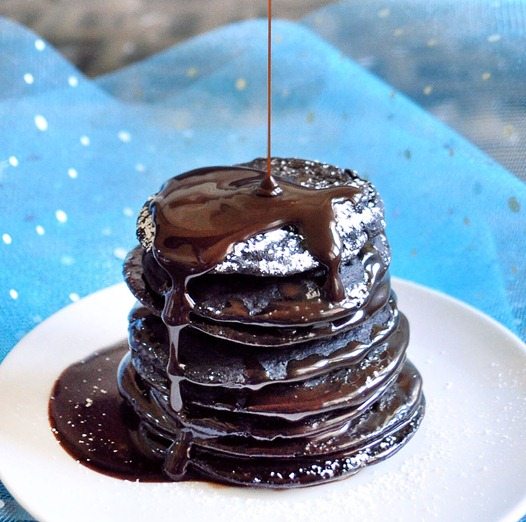 These decadent chocolate brownie batter pancakes are a guiltless, low fat and vegan with only 170 calories for the entire recipe. Can also be made gluten free!