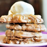 Apple pancakes with ice cream and caramel syrup