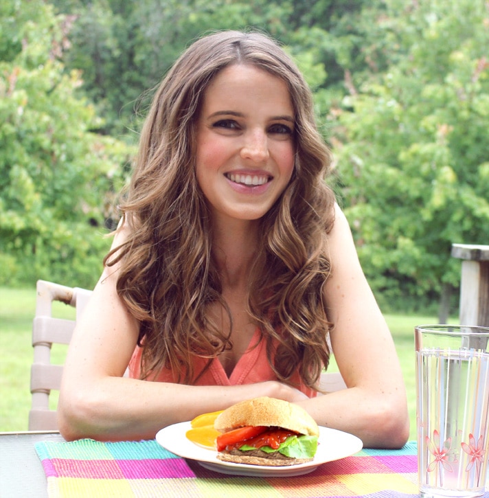 Girl Eating Vegan Burgers