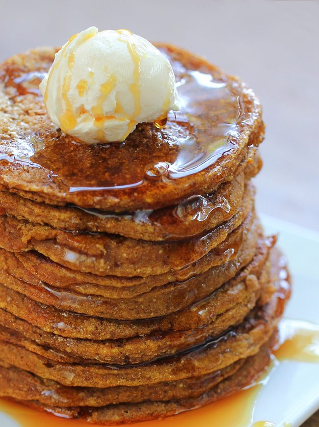 Sixteen light & fluffy pumpkin pancakes from @choccoveredkt... for less than 250 calories. Full recipe: https://chocolatecoveredkatie.com/2013/11/17/pumpkin-pancakes/