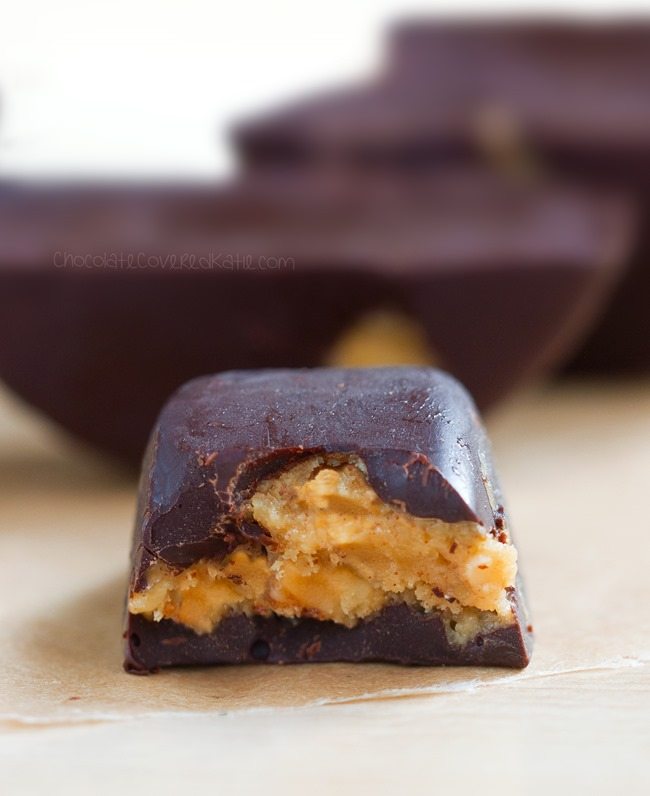 Homemade "5 minute" chocolate peanut butter cups, made with an ice cube tray for whenever a craving hits ... https://chocolatecoveredkatie.com/2016/02/29/ice-cube-tray-chocolate-peanut-butter-cups-recipe/ @choccoveredkt