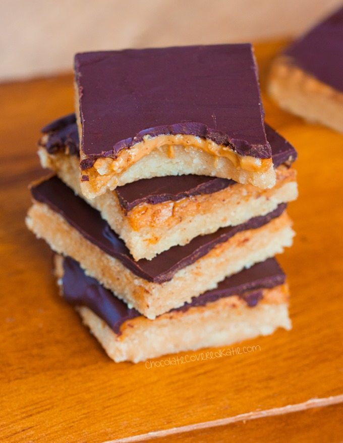 Creamy peanut butter "tagalong" bars - Just like your favorite girl scout cookies, but WAY better because they are bars instead of cookies! @choccoveredkt https://chocolatecoveredkatie.com/