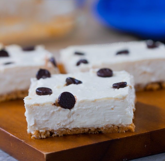 Creamy Chocolate Chip Cheesecake Bars - Ingredients: 12 oz cream cheese, 1 cup yogurt, 2 tsp pure vanilla extract, 1 tbsp lemon juice, 3/4 cup... Full recipe >> https://chocolatecoveredkatie.com @choccoveredkt