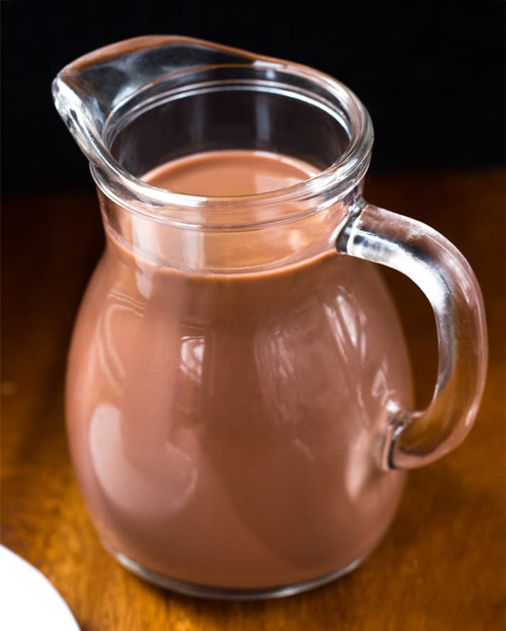 The hot chocolate comes in a large carafe with a side of fresh