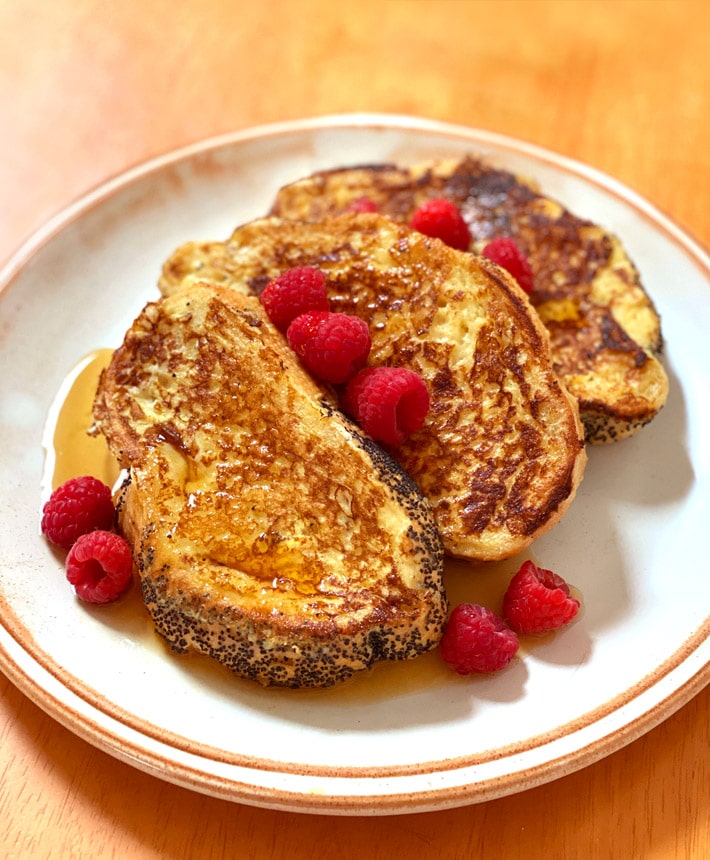The Best Vegan French Toast with no eggs, with raspberries and French bread