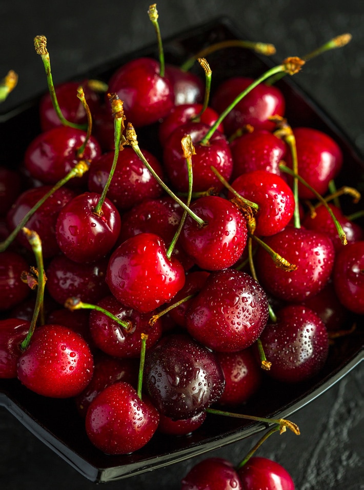red fresh cherries with stems
