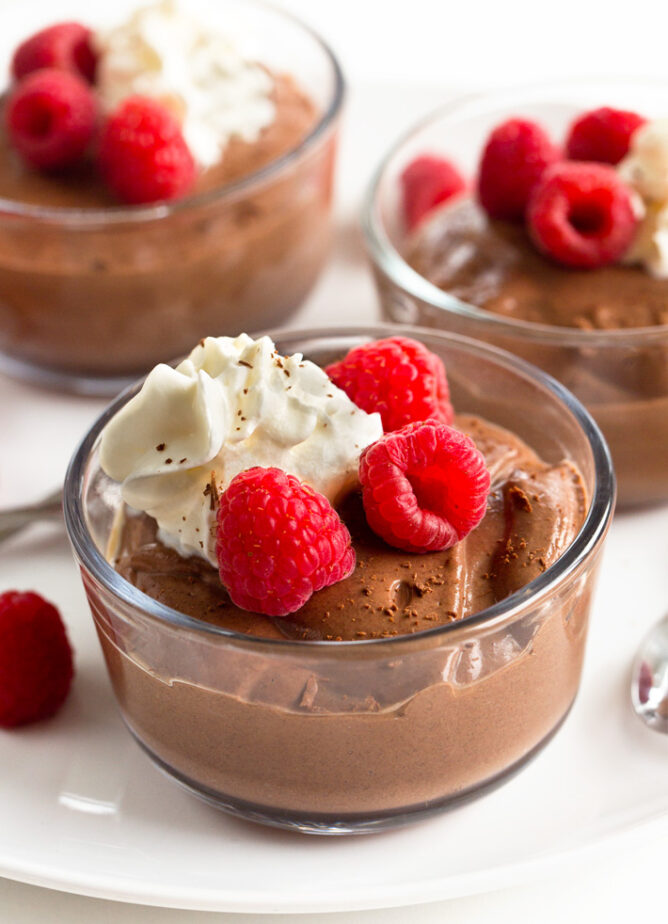 chocolate protein pudding recipe with raspberries and whipped cream