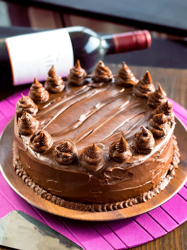 Wine and Frosted Chocolate Layer Cake