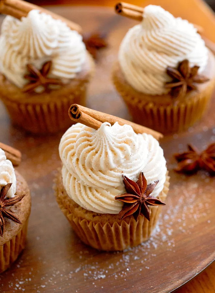 Chai Cupcakes Decorated With Cinnamon Sticks And Star Anise