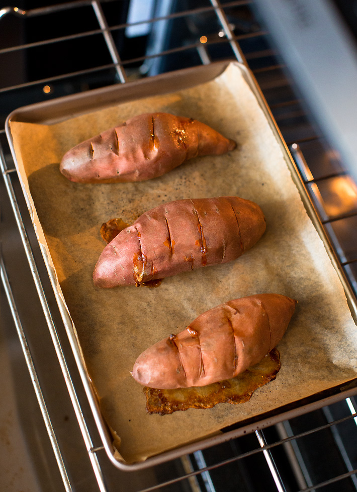 Orange Sweet Potatoes Cooking In The Oven