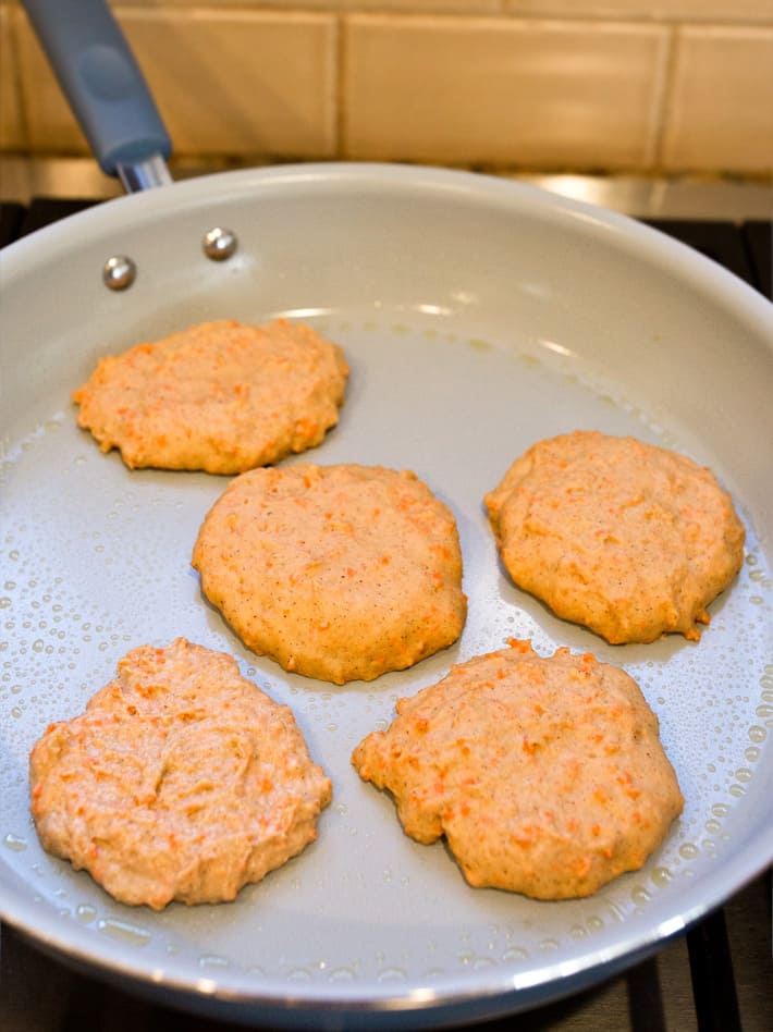 Vegan Carrot Cake Pancakes in a Frying Pan Vegan Carrot Cake Pancakes in a Frying Pan