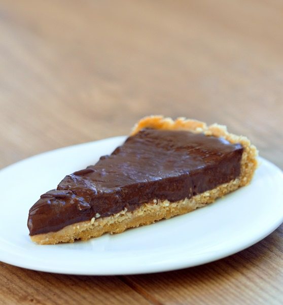 Rich, creamy, thick, chocolatey, gooey chocolate pudding pie... no weird ingredients + no baking required: https://chocolatecoveredkatie.com/2015/07/23/homemade-chocolate-pudding-pie-no-tofu/