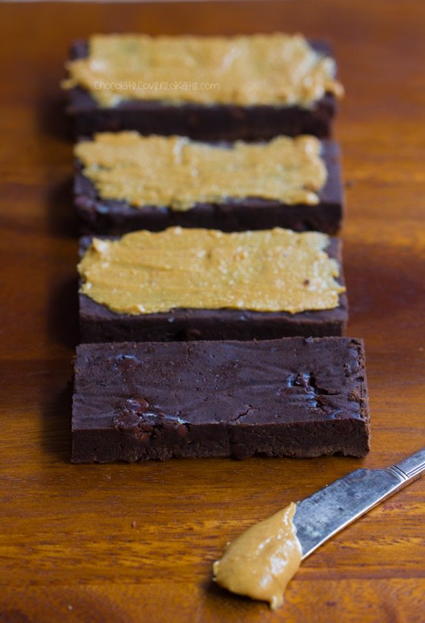 NO flour, NO refined sugar chocolate protein bars - tastes like eating a Reeses Peanut Butter Cup... but GOOD for you!!! - https://chocolatecoveredkatie.com/2016/01/06/homemade-protein-bars-chocolate-peanut-butter-vegan/ @choccoveredkt