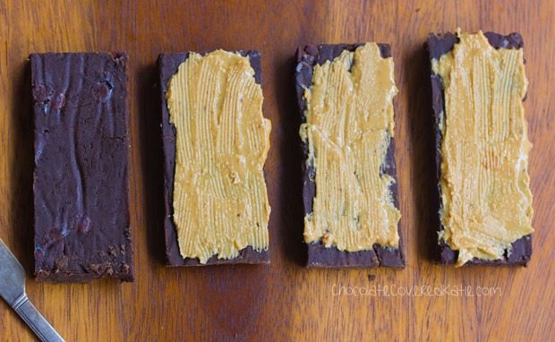 Homemade Protein Bars - Avoid the unhealthy processed ingredients by making your own HEALTHY chocolate protein bars at home - These bars taste like a Reeses peanut butter cup!!! https://chocolatecoveredkatie.com/2016/01/06/homemade-protein-bars-chocolate-peanut-butter-vegan/ @choccoveredkt