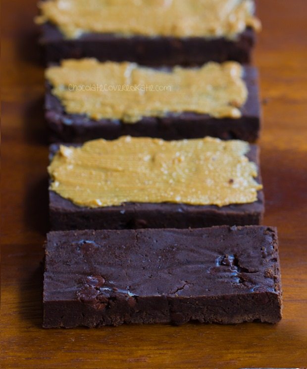 Homemade Protein Bars - Avoid the unhealthy processed ingredients by making your own HEALTHY chocolate protein bars at home - These bars taste like a Reeses peanut butter cup!!! https://chocolatecoveredkatie.com/2016/01/06/homemade-protein-bars-chocolate-peanut-butter-vegan/ @choccoveredkt