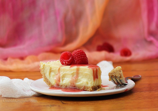 Greek Yogurt Cheesecake - Ultra smooth and rich and creamy cheesecake that absolutely melts in your mouth! + NO cream cheese or heavy cream required. It's cheesecake that is actually GOOD for you! Recipe link: https://chocolatecoveredkatie.com/2012/09/24/greek-yogurt-cheesecake/