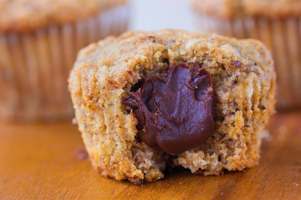 Banana Bread Nutella Muffins – soft and fluffy banana bread muffins... w/ a secret Nutella filling… https://chocolatecoveredkatie.com/2015/11/05/nutella-muffins/ from @choccoveredkt