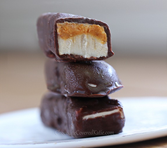 You kind of NEED these in your life. Recipe from @choccoveredkt... they taste like a Snickers ice cream bar! https://chocolatecoveredkatie.com/2013/07/29/snickers-recipe-ice-cream-bars/