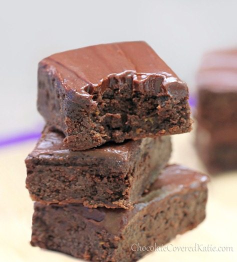 Rich, fudgy, moist chocolate brownies - with a secret! The zucchini makes these brownies MELT-IN-YOUR-MOUTH without the fat… This recipe is to die for! https://chocolatecoveredkatie.com/2013/05/31/healthy-chocolate-fudge-zucchini-brownies/ @choccoveredkt