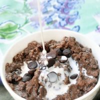 Chocolate Oatmeal - Ingredients: 1/2 cup rolled oats, 1 cup milk of choice, 2 tbsp cocoa powder, 1 tsp vanilla, 1/4 cup... Full recipe: https://chocolatecoveredkatie.com/2011/09/21/five-minute-chocolate-oatmeal/ @choccoveredkt